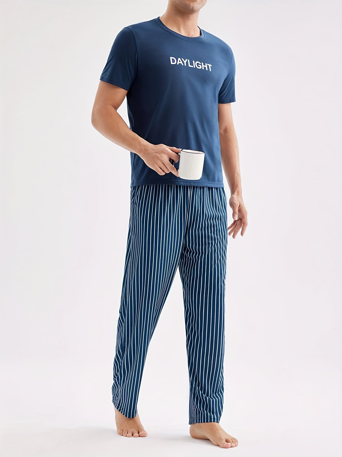 Men's Casual Crew Neck Short Sleeve Pajama Set with Striped Pants, made of 100% Polyester Knit Fabric, with Slight Stretch for All Season Comfort.