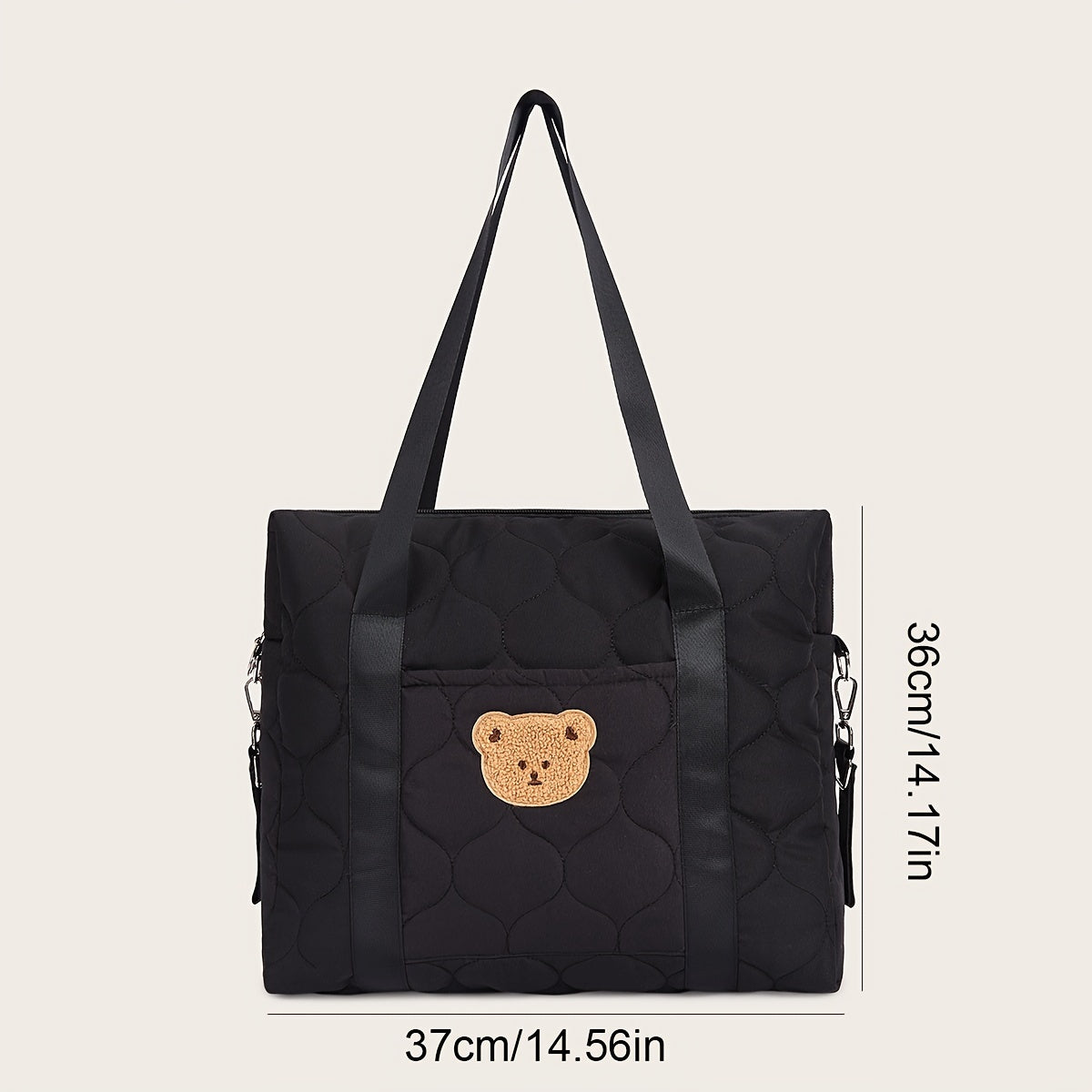 Large black parent bag with ample storage space, perfect for taking on the go. Features a shoulder strap for easy carrying.