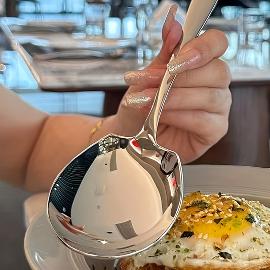 Durable stainless steel serving spoon for restaurants and catering, with metallic finish and dishwasher safe.