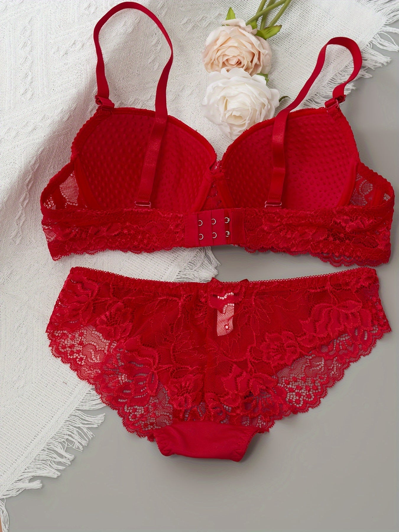 Floral lace lingerie set with bow detail and comfortable underwire bra.