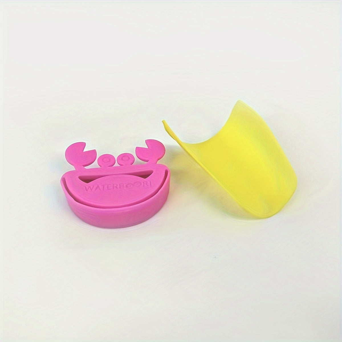 Crab-shaped water spout for kids makes hand washing fun with cartoon design.