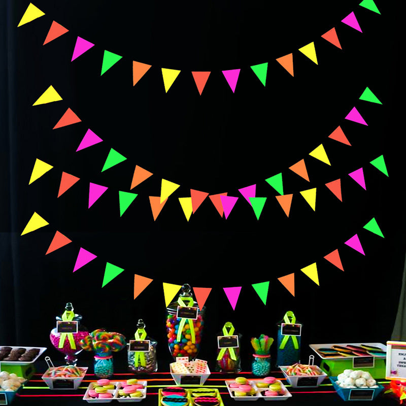 Fluorescent paper decoration with star discs, triangles, and pull flowers.