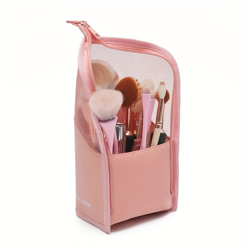 Waterproof wash bag with travel-friendly makeup brush storage, compartmentalized cosmetic storage, and a clear, transparent design.