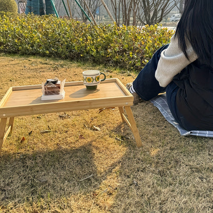 Bamboo folding table with tray, adjustable for bed, sofa, outdoors. Perfect gift for Father's Day and Mother's Day.