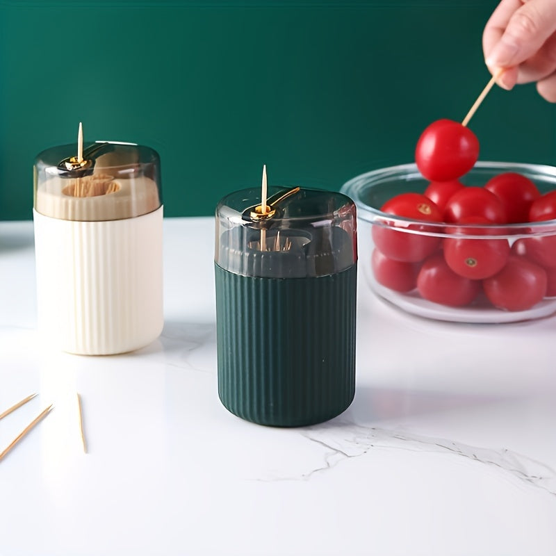 Creative toothpick box with automatic release press-type feature, also functions as a dental floss box. Perfect for home use.