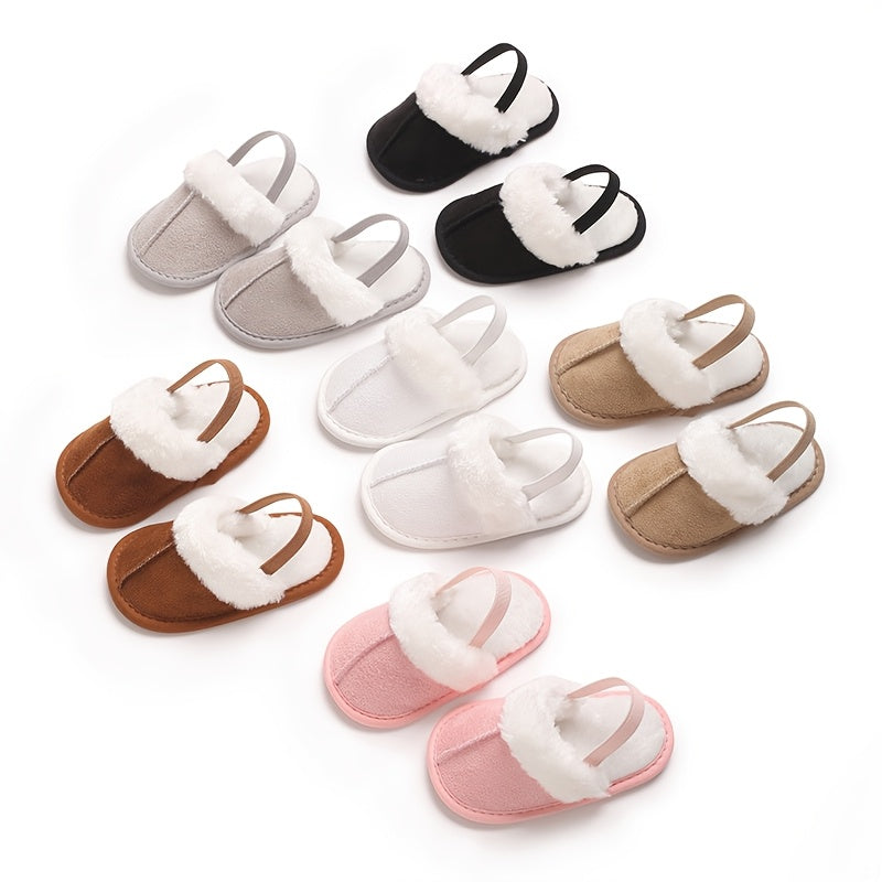 Adorable baby slippers, from 0-18 months, with plush lining for warmth and soft soles for comfort. Perfect for autumn, indoor leisure, and early walking.