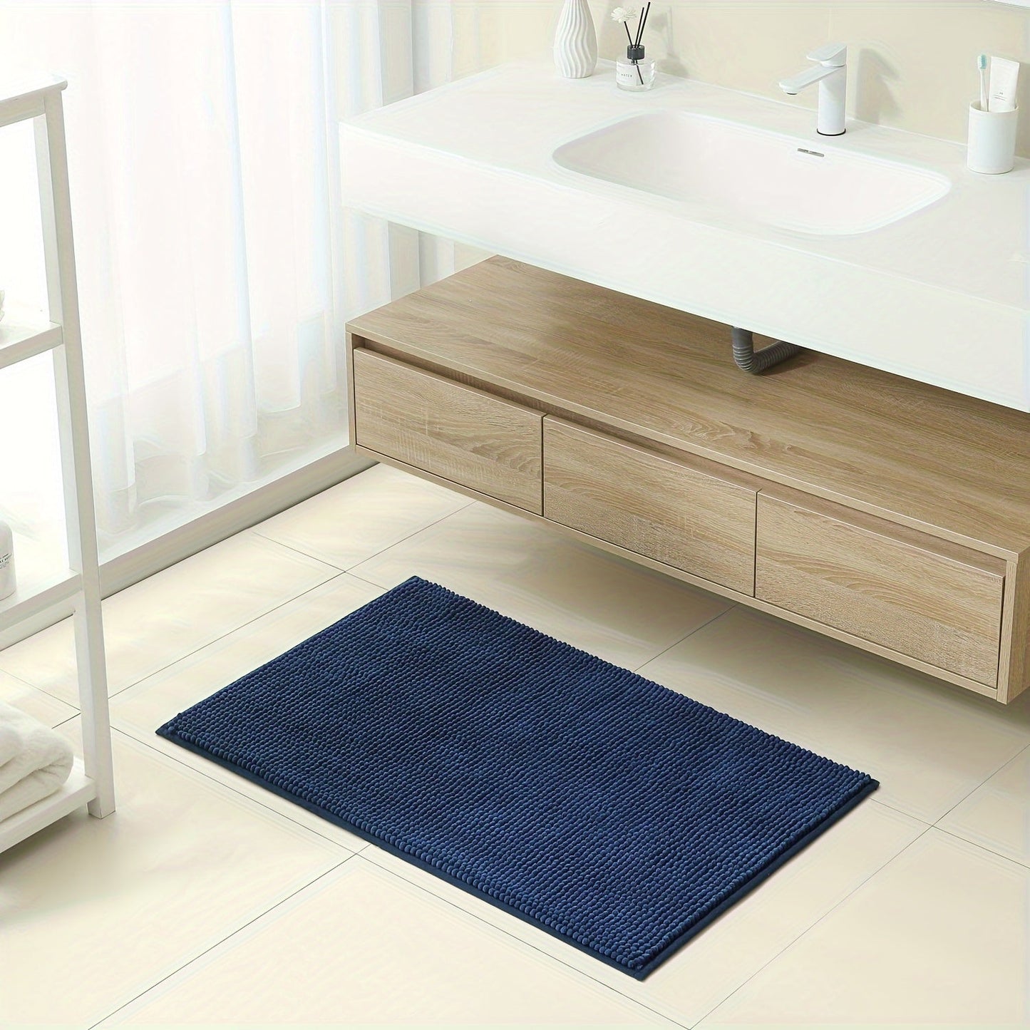 Get this luxurious Chenille Bath Mat, 2cm Thick, with a non-slip, super absorbent, quick-dry design. Made of woven polyester with rubber backing, this mat weighs 1450gsm and is perfect for the bathroom, kitchen, bedroom, or entryway. It also makes a