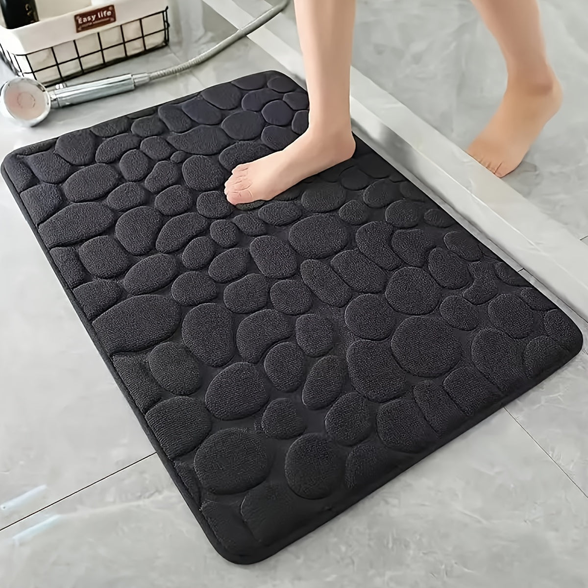 Pamper Your Feet with our Luxurious 3D Pebble Design Bath Rug! This Quick-Dry Non-Slip Bathroom Mat is made of Soft and Comfortable Polyester Memory Foam. It is Woven with a density of 700gsm and is 1.5cm Thick. Perfect for Home Decor and as Holiday