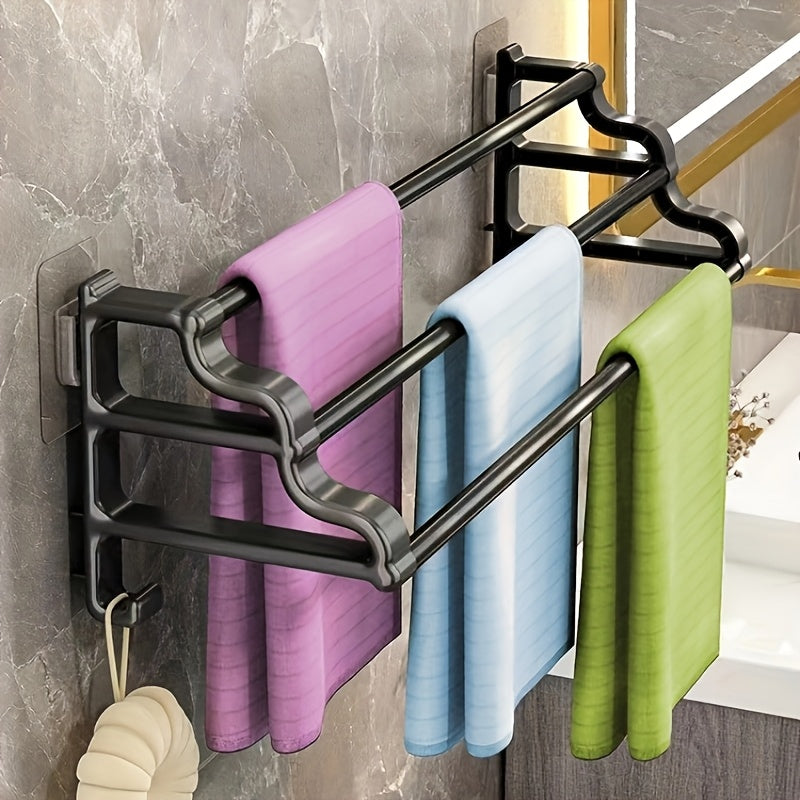 Durable triple bar towel rack with wall mount for organized bathroom storage.