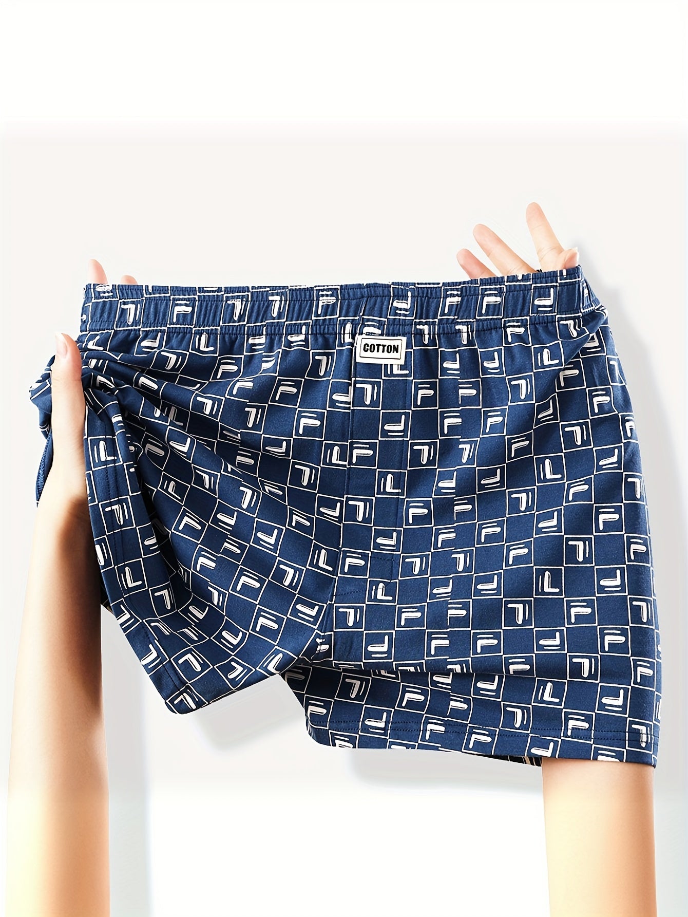 3 pieces of men's cotton boxer briefs featuring trendy plaid and denim-style patterns that are soft, breathable, and comfortable for casual wear and sleep with an elastic waistband.