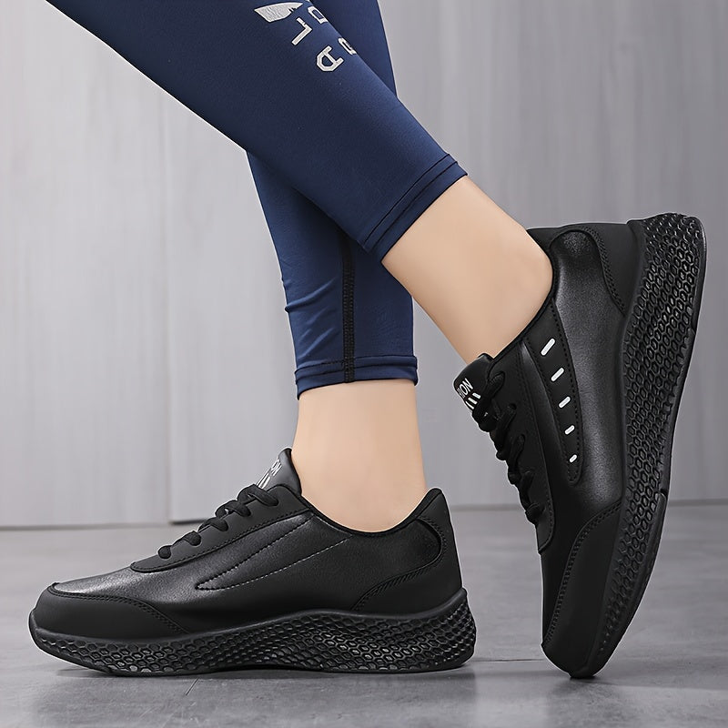 Black platform sneakers for women with lace-up design and comfortable fit, suitable for outdoor activities.