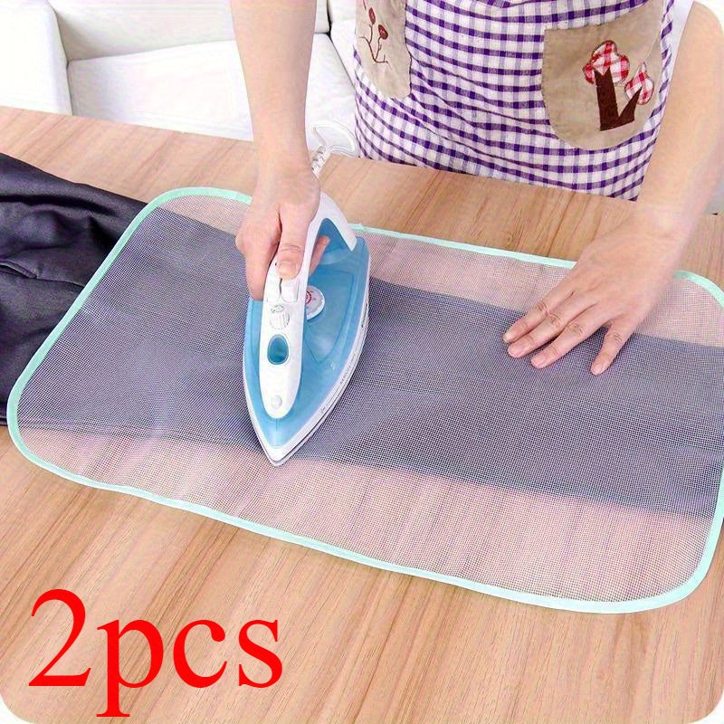 Durable ironing mesh pad for smooth, high-temperature ironing with zipper and button protection, machine washable.