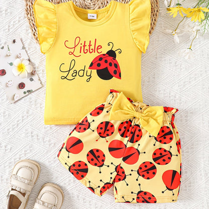 Adorable ruffled sleeve t-shirt and bow/ladybug shorts set for baby girls, ideal for casual outdoor wear this season.