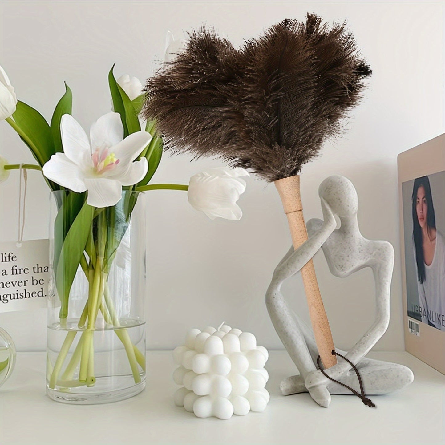 Natural feather duster with a fluffy 40.64 cm head and a wooden handle for cleaning homes, offices, and cars. Perfect cleaning supply.