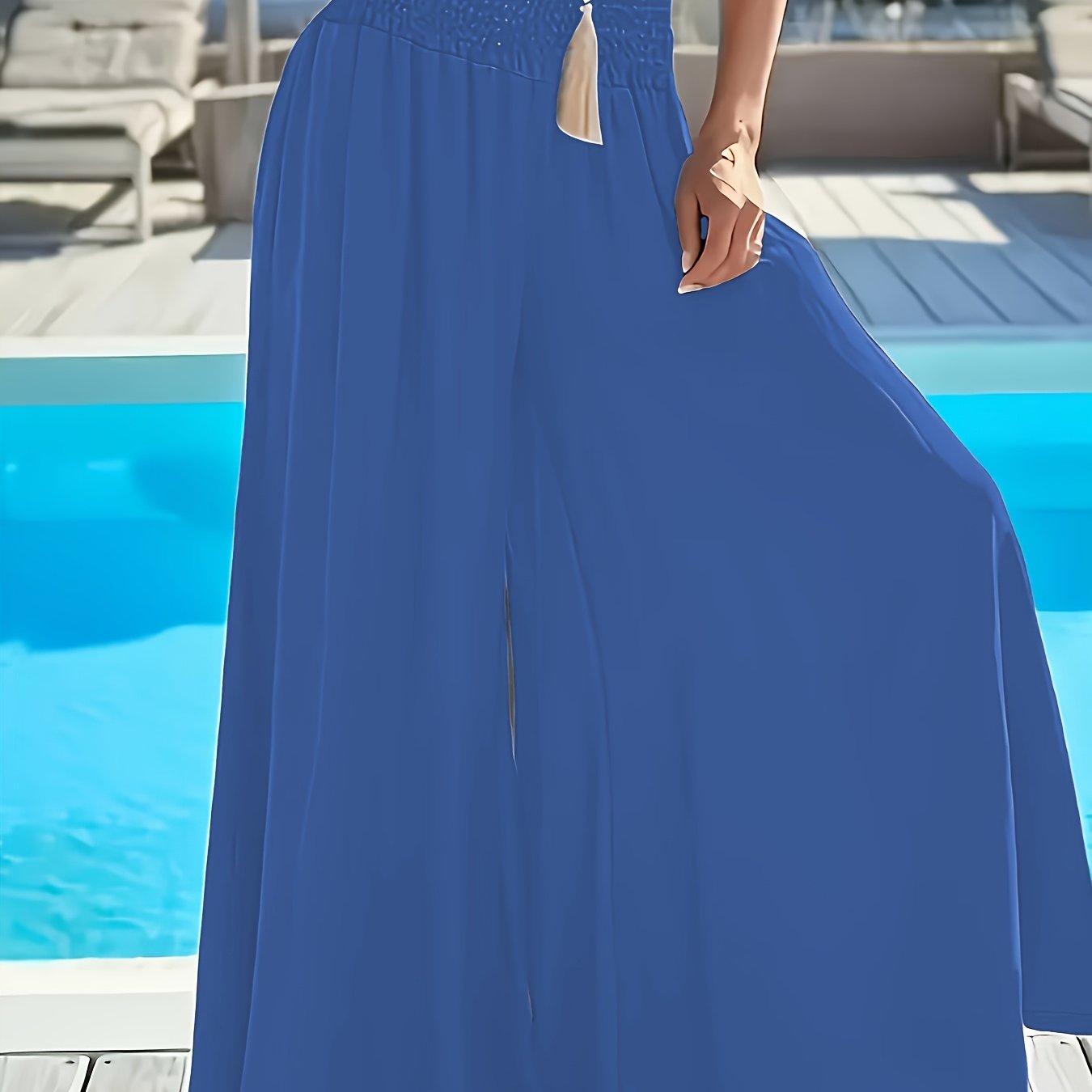 Plus size women's high-waisted wide leg pants in solid green polyester with tassel detail, perfect for comfortable casual outings.