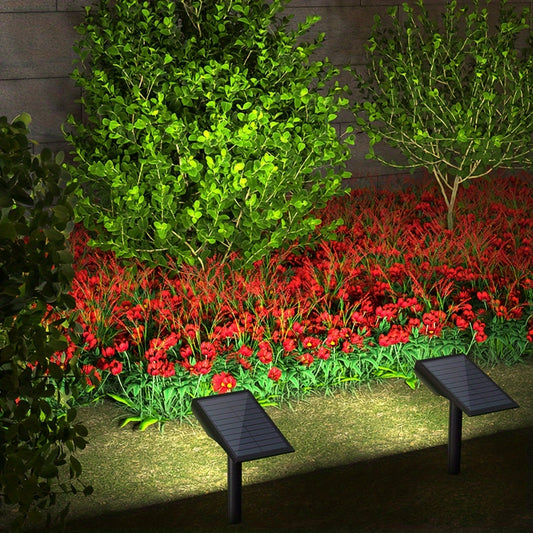 Solar garden lights, 4-pack with 9 LEDs and polished finish. Energy-efficient solar-powered landscape lighting with 2000mAh lithium battery.