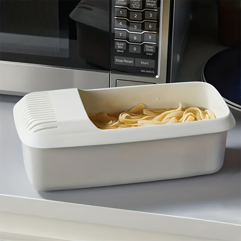 This essential kitchen gadget is perfect for quick meals in apartments and dorms. The heat-resistant Microwave Pasta Cooker with Strainer is made of easy-clean plastic and is designed for hassle-free noodle steaming.