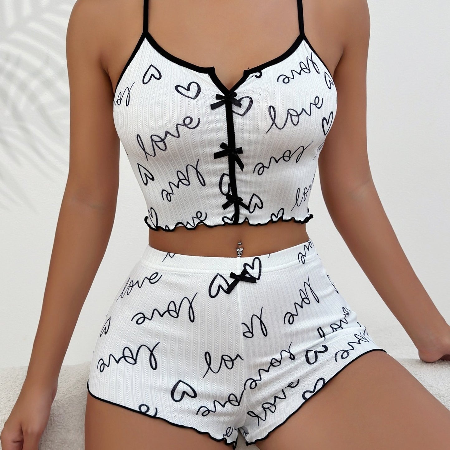 Heart print bow knot pajama set for Valentine's Day, including crop cami top and elastic shorts for women's sleepwear.