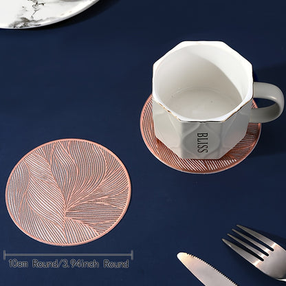 6 PVC round place mats with leaf pattern, heat resistant and non-slip. Hand wash only. Perfect for dining, weddings, and holiday decor.