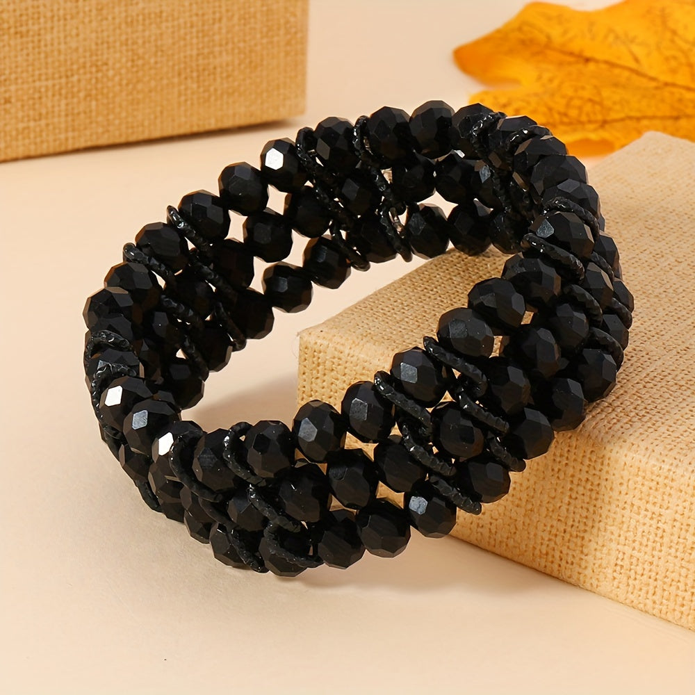 A versatile black beaded stretch bracelet in boho style for women made of aluminum alloy and artificial crystal, perfect for daily wear and gifting all year round.