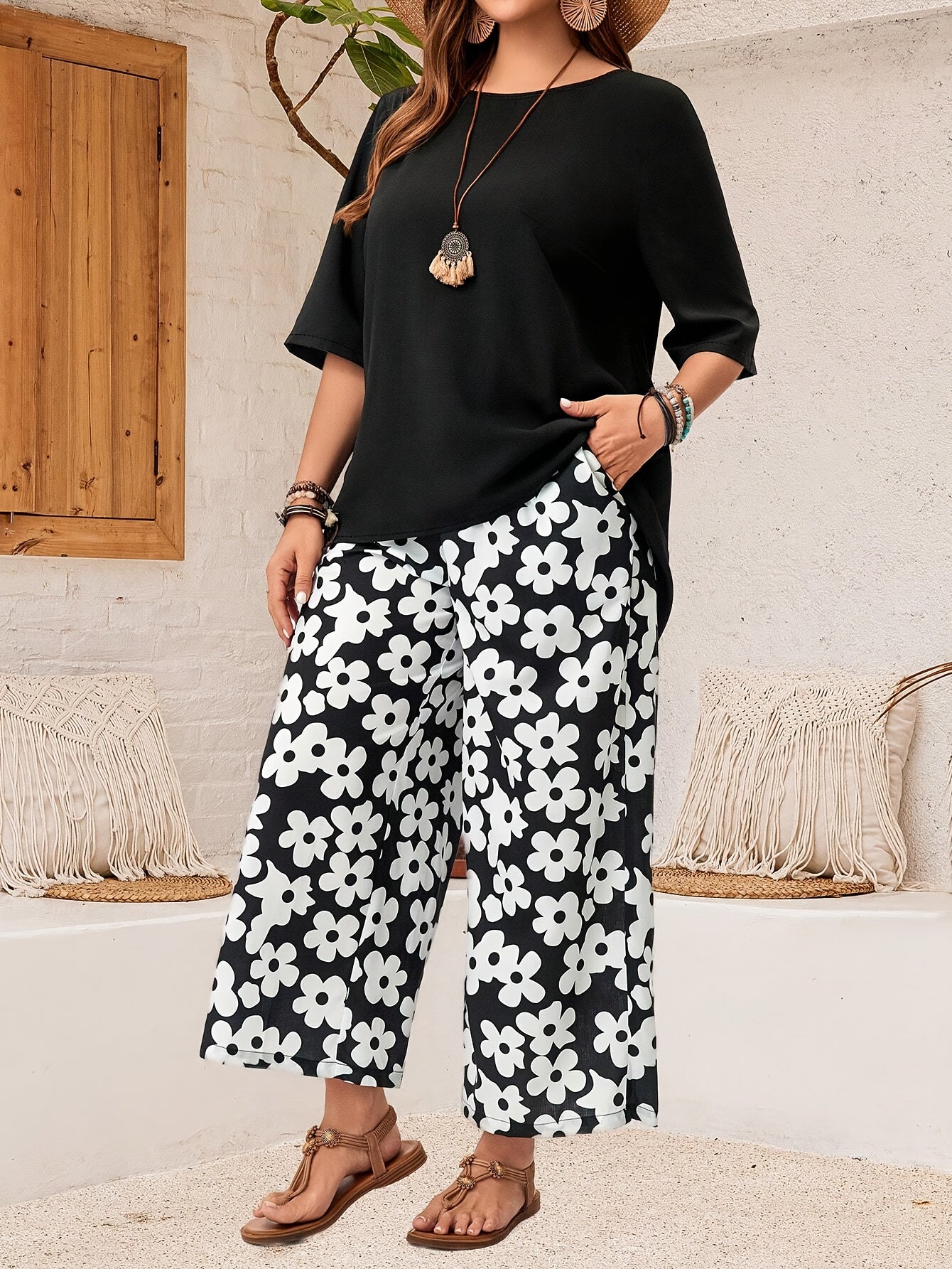 Plus size casual pants set with crew neck top and floral print pants for spring and summer. Women's plus size clothing.