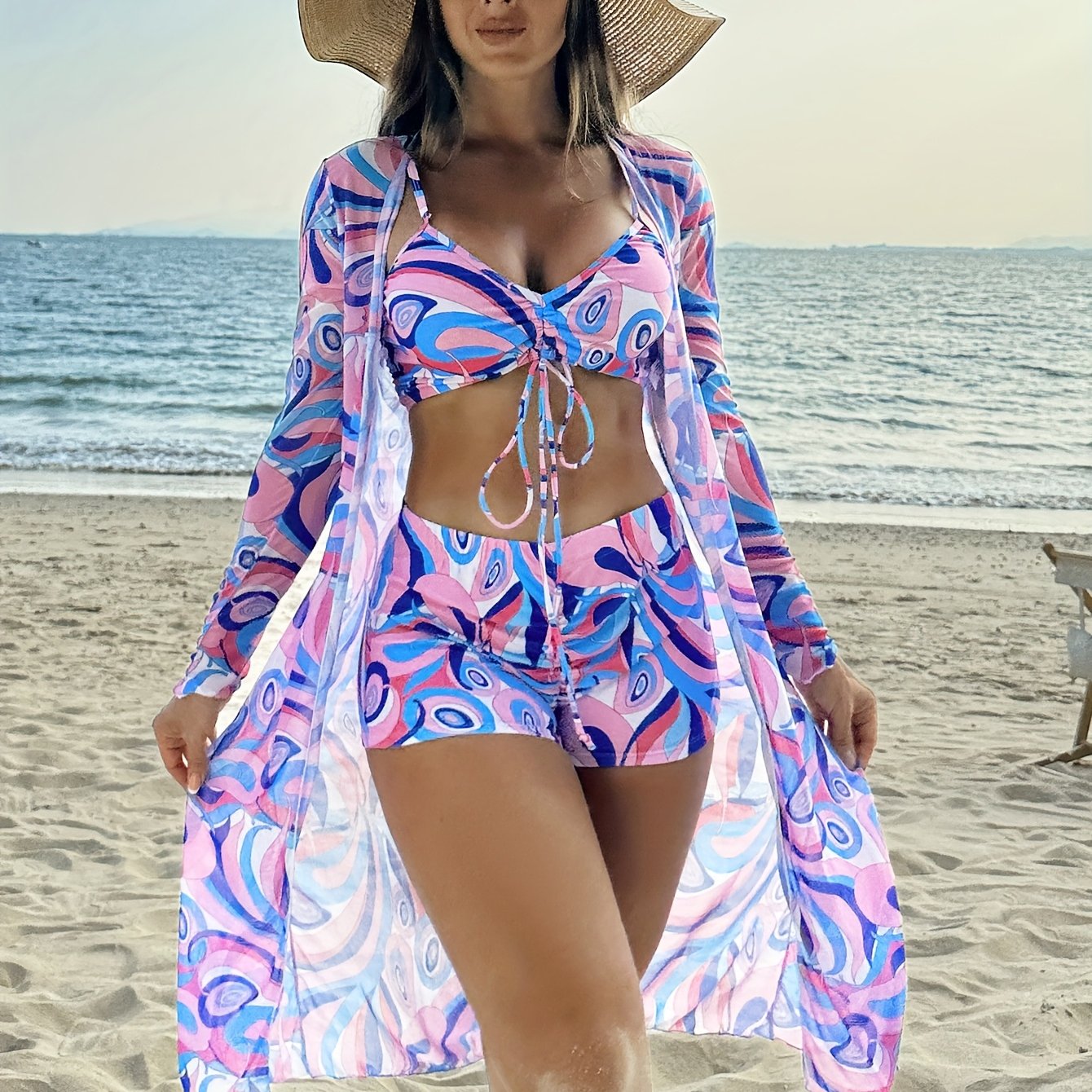 Stylish geometric bikini set for women with long sleeve cover-up - made from stretchy, non-see-through polyester blend that can be machine washed.