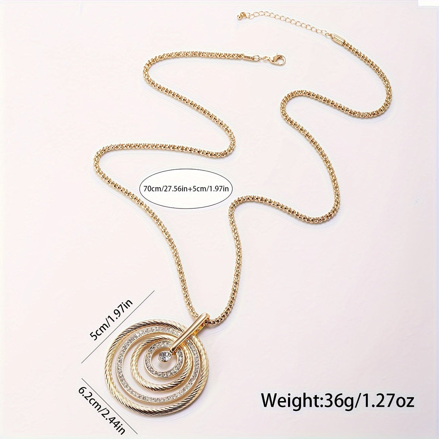 Retro Style Stainless Steel Pendant Necklace with Golden Pendant, a long chain necklace designed for women. Perfect as a sweater chain or as a unique piece of jewelry, this necklace would also make a great birthday gift.