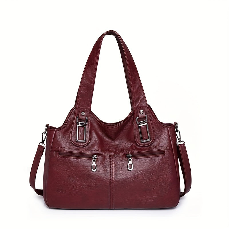 Stylish women's crossbody bag with multiple pockets, detachable strap, chic design, zip closure, and polyester lining.