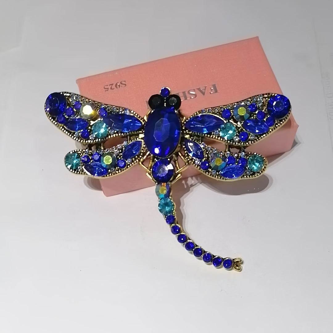 Dragonfly-shaped brooch with a retro design, adorned with sparkling rhinestones. Perfect for adding a touch of elegance to women's dresses, coats, sweaters, or corsages.