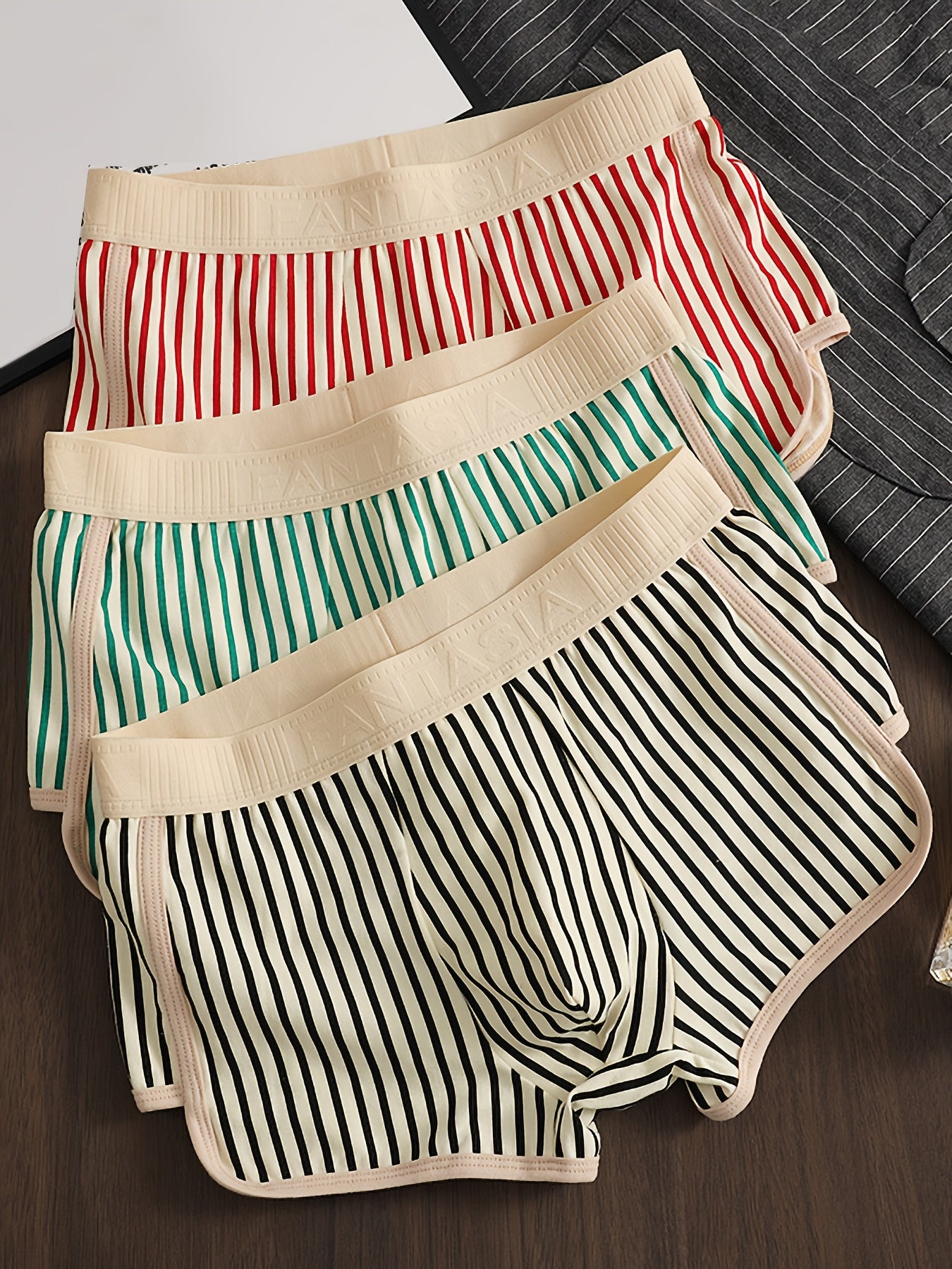 Men's three-pack striped underwear with casual flat-leg shorts, breathable and comfortable elastic waistband, perfect for spring and summer sports.