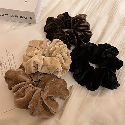 Velvet Scrunchies set of 4 in beige, brown & black, for comfortable and stylish hairstyles.