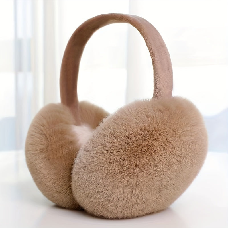 Stay cozy and stylish this winter with our Women's Foldable Knit Cashmere Earmuffs. Crafted with faux fur for warmth and comfort, these earmuffs are perfect for outdoor activities. The stretchable plush design hugs your ears, keeping them