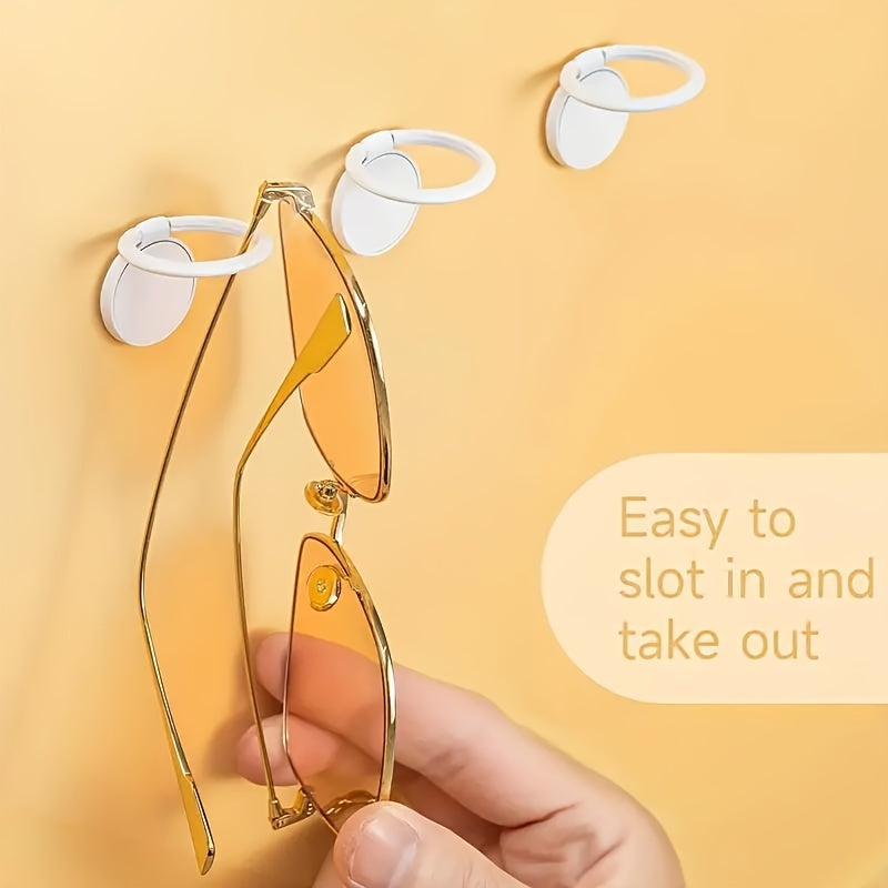 Wall mounted eyeglasses holder for display, organize and hang up to 4 pairs of glasses.