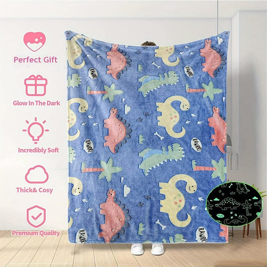 The perfect gift for dinosaur enthusiasts - a cozy blue luminous polyester throw blanket that glows in the dark.