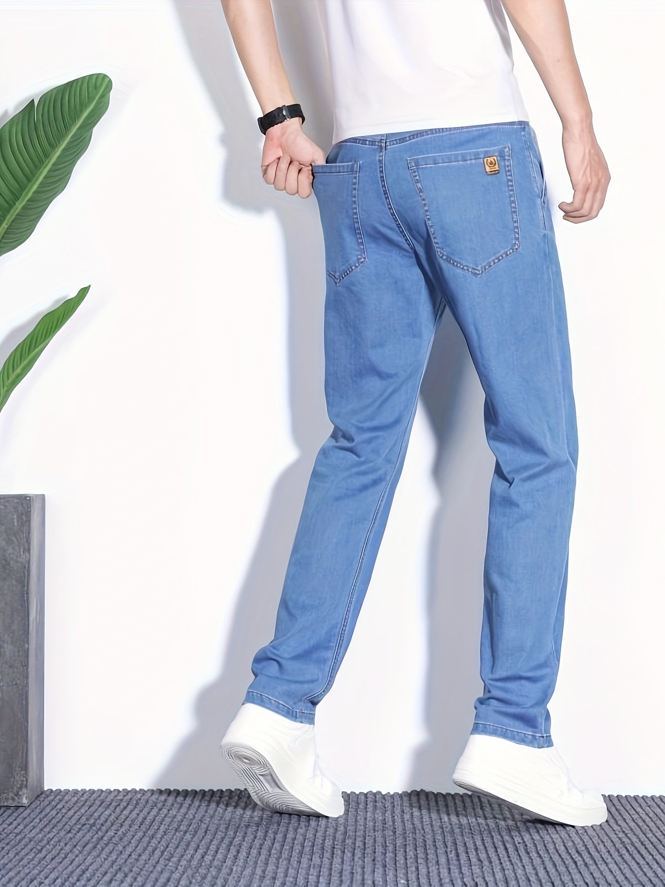 Summer jeans for men, regular fit with breathable lightweight denim and pockets.