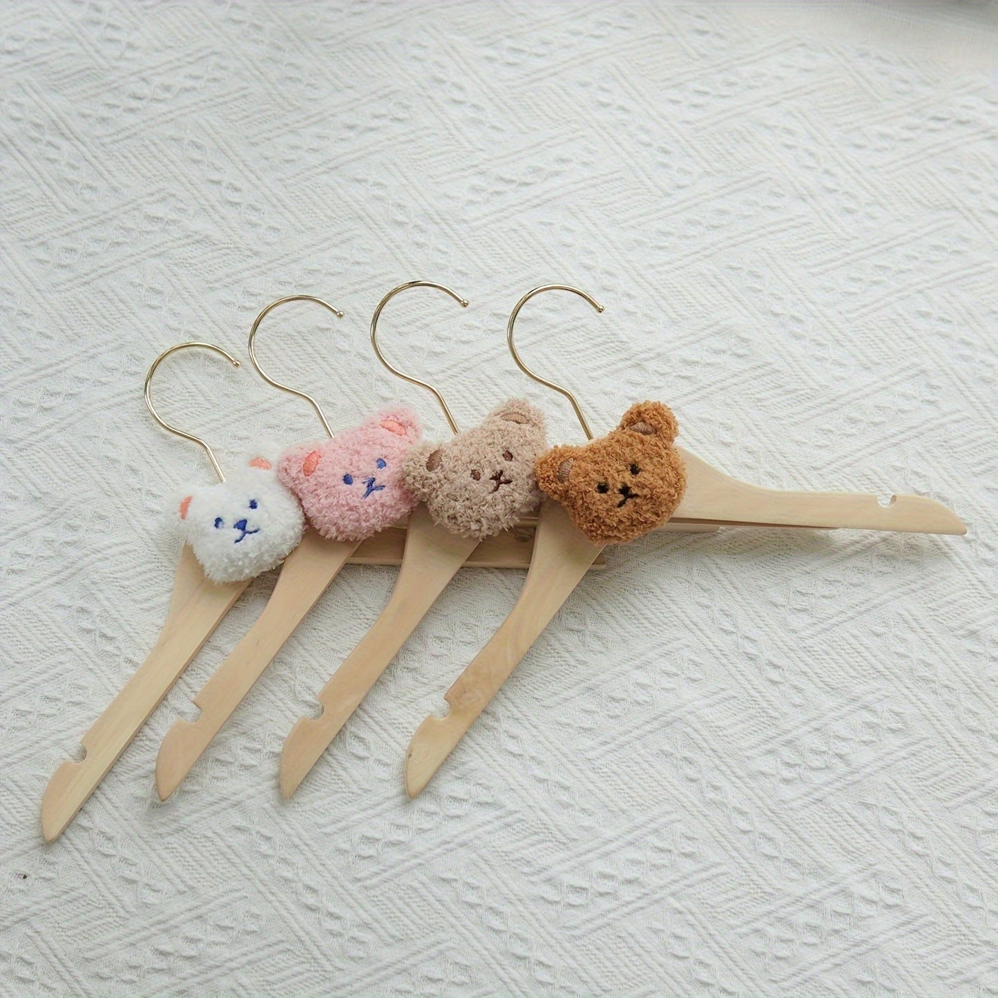 Durable and Lightweight Wooden Clothes Hangers featuring a Nordic Style Cartoon Bear Design, with Swivel Hooks for easy maneuvering. Recommended for Ages 14 and up.