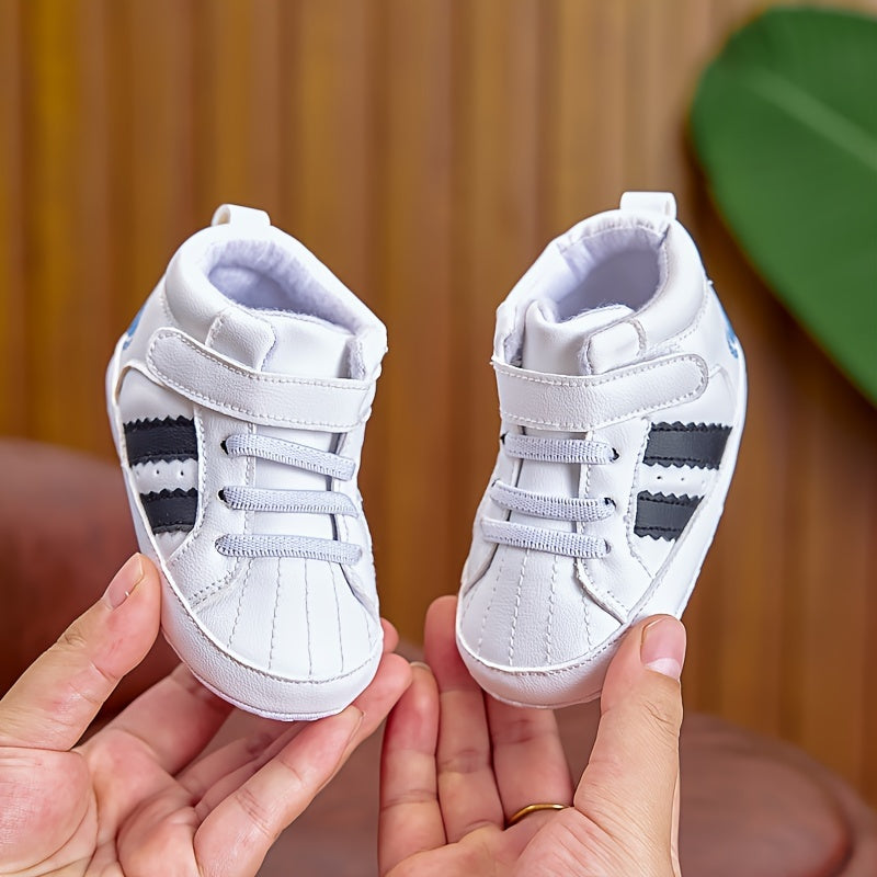 Unisex baby sneakers with adjustable strap closure, PU upper, soft fabric sole, anti-slip for spring/fall - perfect for everyday wear.