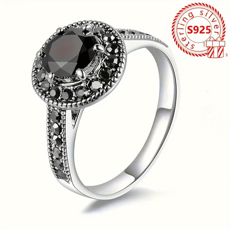 This stunning 925 sterling silver ring features a vintage-inspired design with a black cubic zirconia stone. Perfect for both casual wear and gifting, this ring comes with a gift box and weighs 2.9g. Ideal for ladies who appreciate timeless elegance.