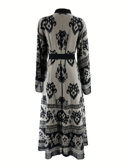 Allover print belted maxi dress with crew neck, bell sleeves, and pleats for spring & fall. Women's clothing.