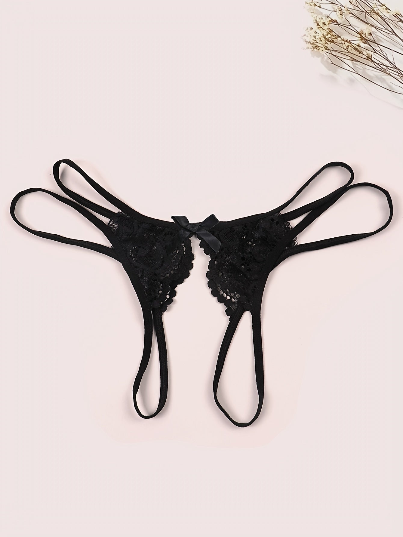 Seductive and comfortable velvet thong with open legs and bow detail for women