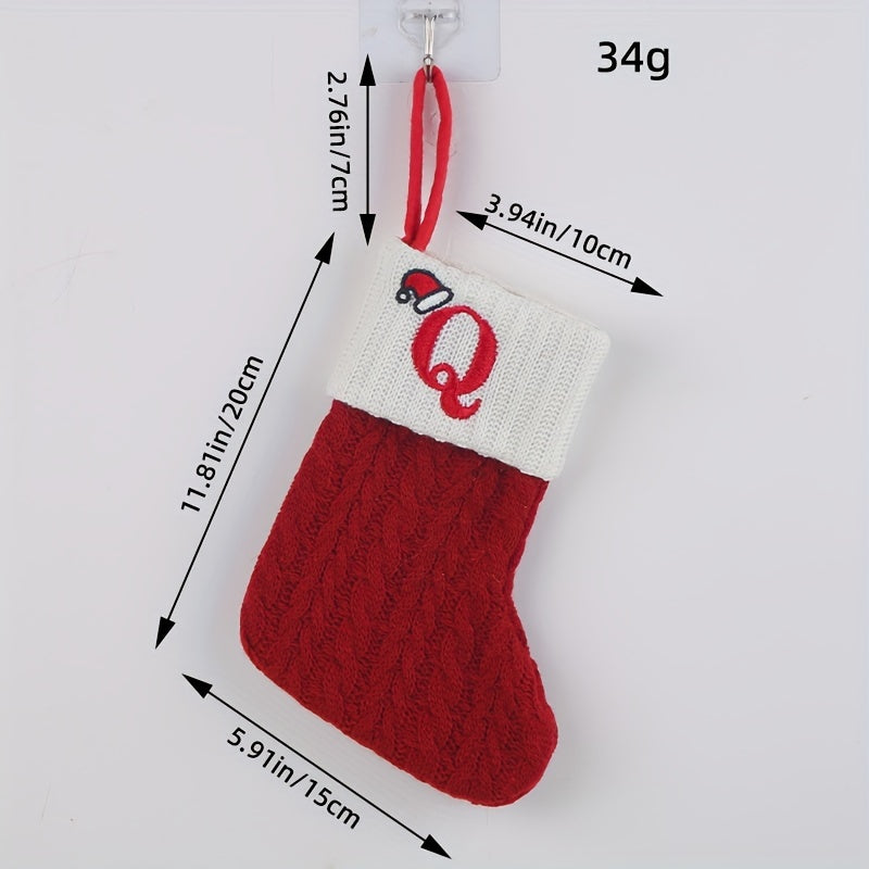 Knitted letter Christmas socks for home tree ornaments; red socks in gift bag for festive attire.