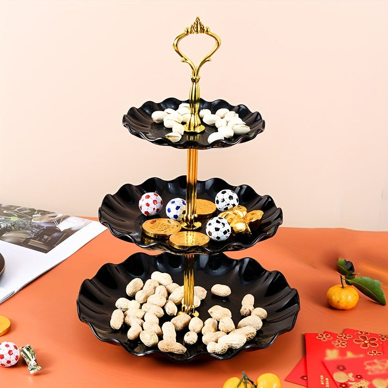 Three-layer candy plate for household living room, ideal for storing dried fruit. Creative multi-layer plastic fruit basket in festive New Year style.