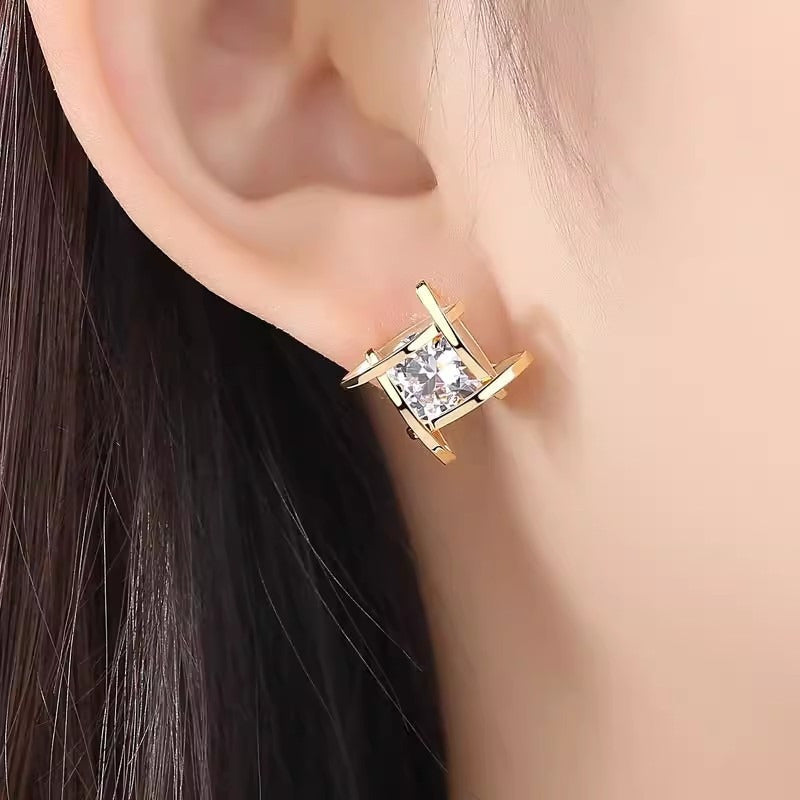 These elegant and luxurious S925 sterling silver post earrings feature synthetic cubic zirconia in an irregular shape, making them a stylish choice for women's fashion jewelry. Perfect for everyday wear or as a special gift, they are ideal for