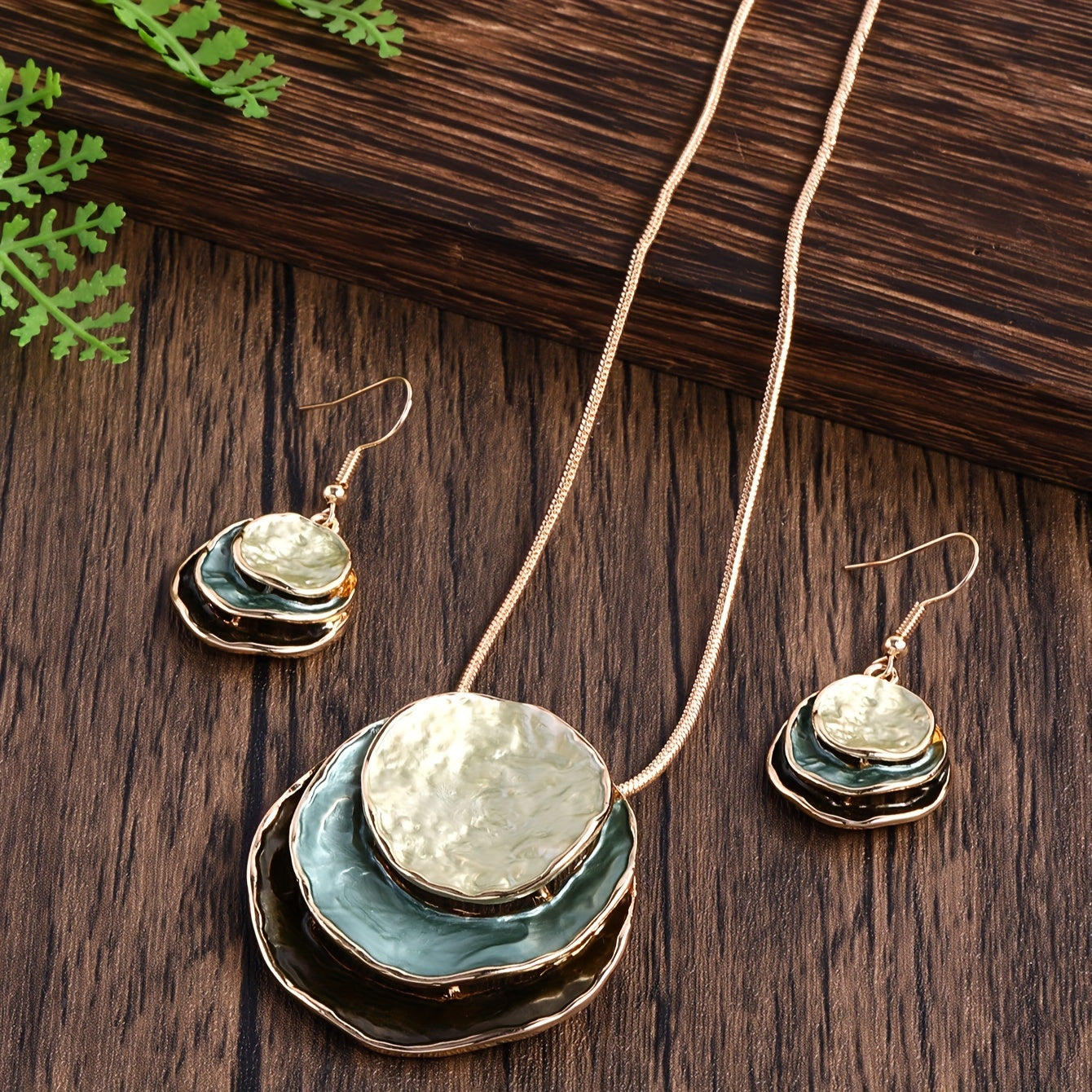 Chic and stylish Bohemian enamel jewelry set featuring a three-layer circular design made of zinc alloy. This adorable set makes a perfect gift for the special ladies in your life, ideal for holiday parties or as a girlfriend gift. Includes a necklace