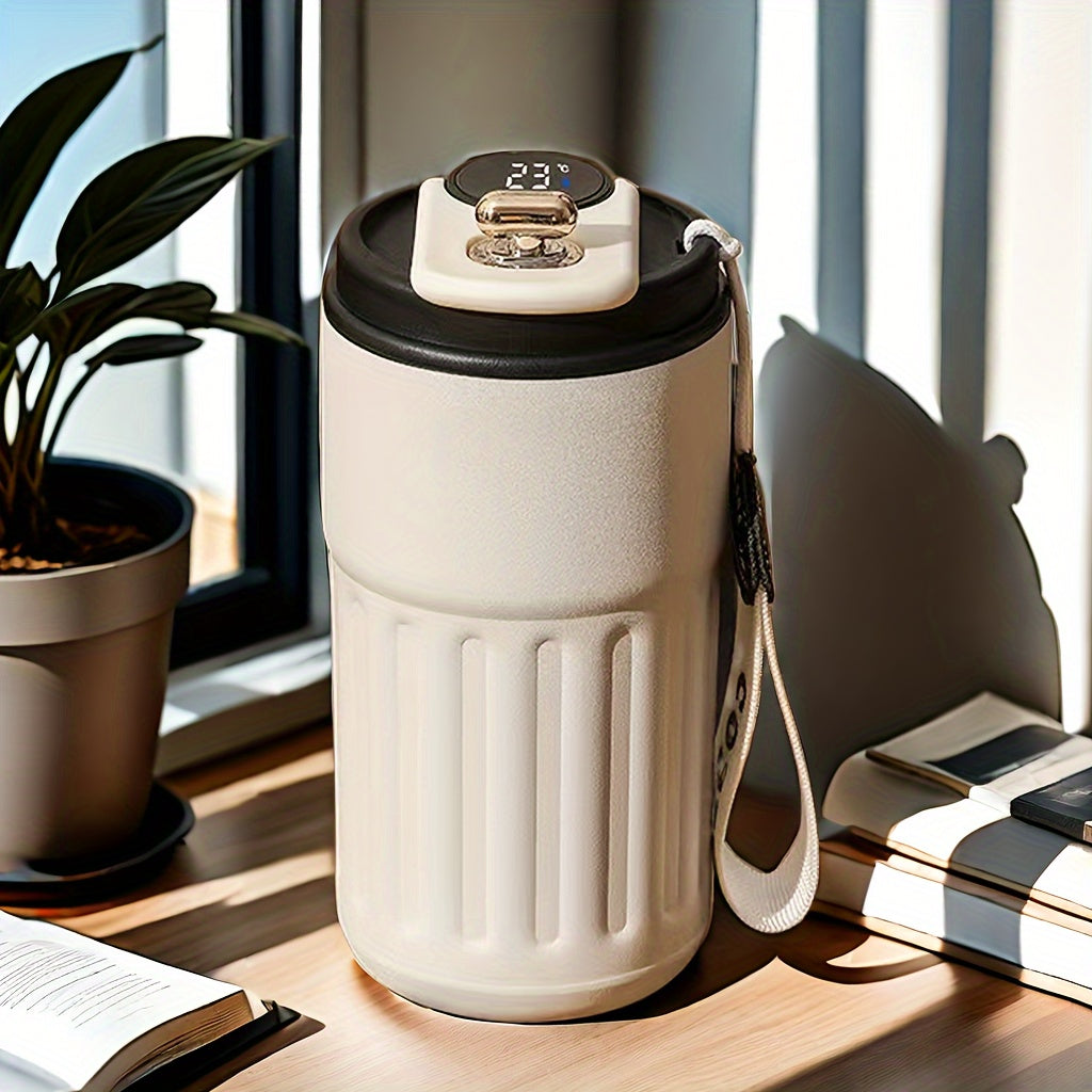 A 410ml stainless steel travel mug with temperature display, keeps beverages hot or cold, perfect for any occasion.