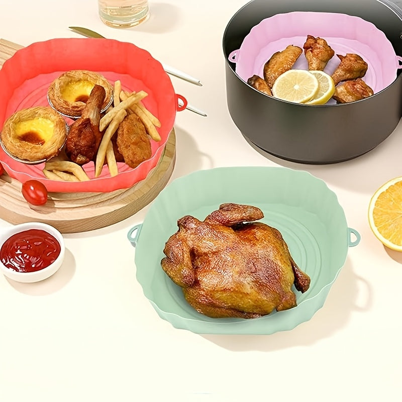 Two silicone air fryer liners, non-stick and reusable bakeware that is easy to clean and durable kitchen accessories designed to line your air fryer.