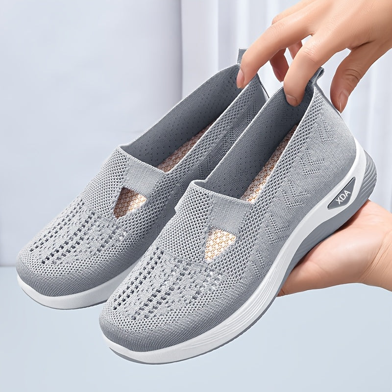 Casual slip on sneakers for women, lightweight and breathable with fabric upper and rubber sole, perfect for spring and summer.