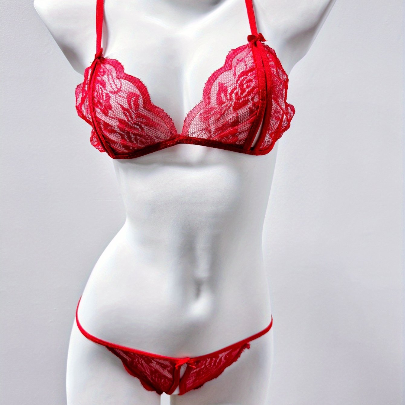 Attractive lingerie sets, bras, and crotchless panties for women.