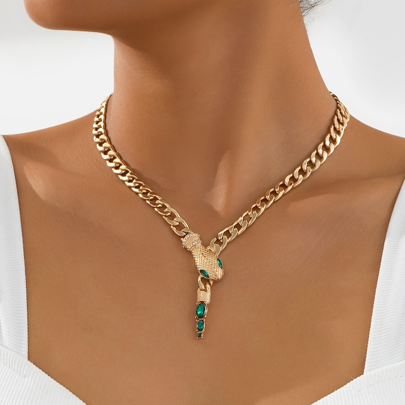 Add a touch of elegance with our stunning snake pendant necklace, adorned with shimmering rhinestones. Made from luxurious zinc alloy, this clavicle chain is perfect for women who want to stand out at parties or give a thoughtful gift.