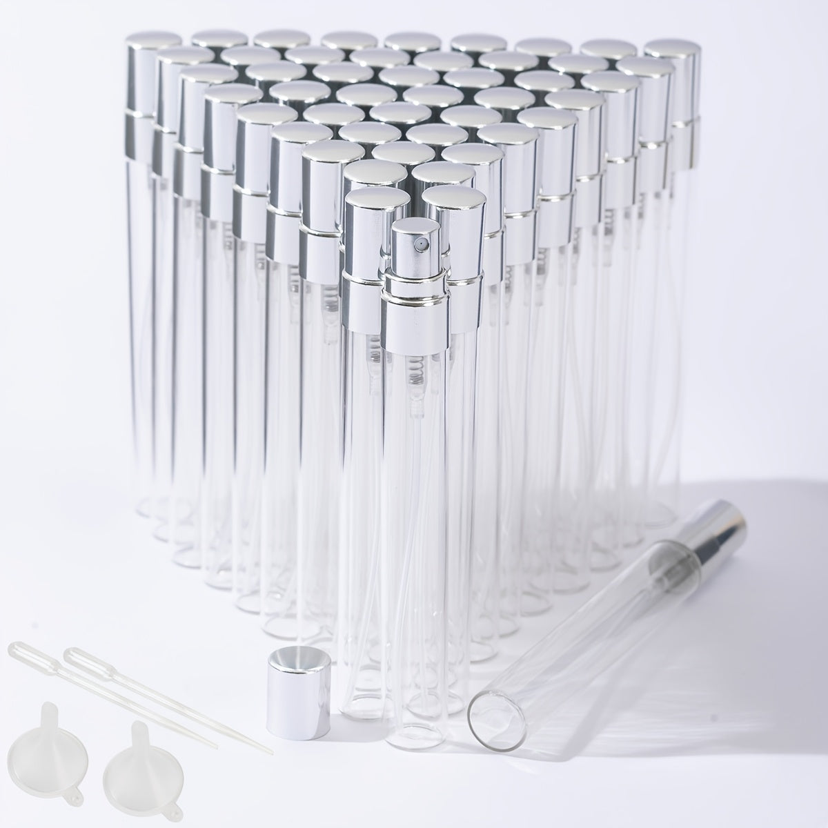 50 transparent glass bottles for decanting 5ml and 10ml perfumes, with spray tops.